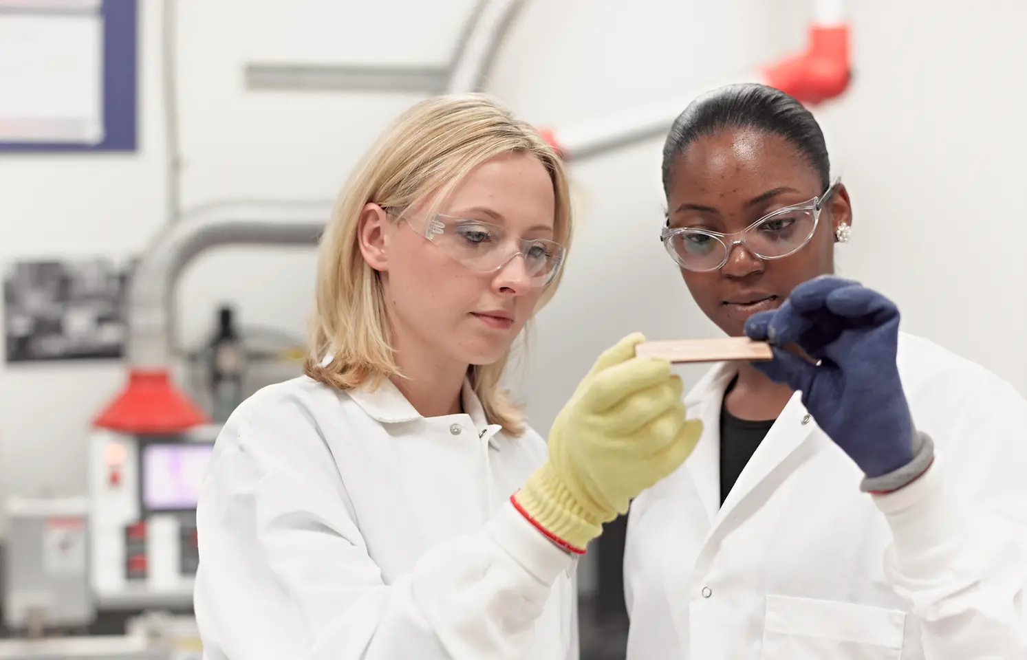 Two women in laboratory.